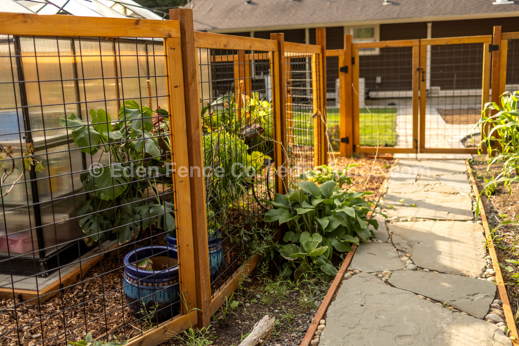 Goldbar, Washington garden area backyard with cedar hog panel fence by Eden Fence Co