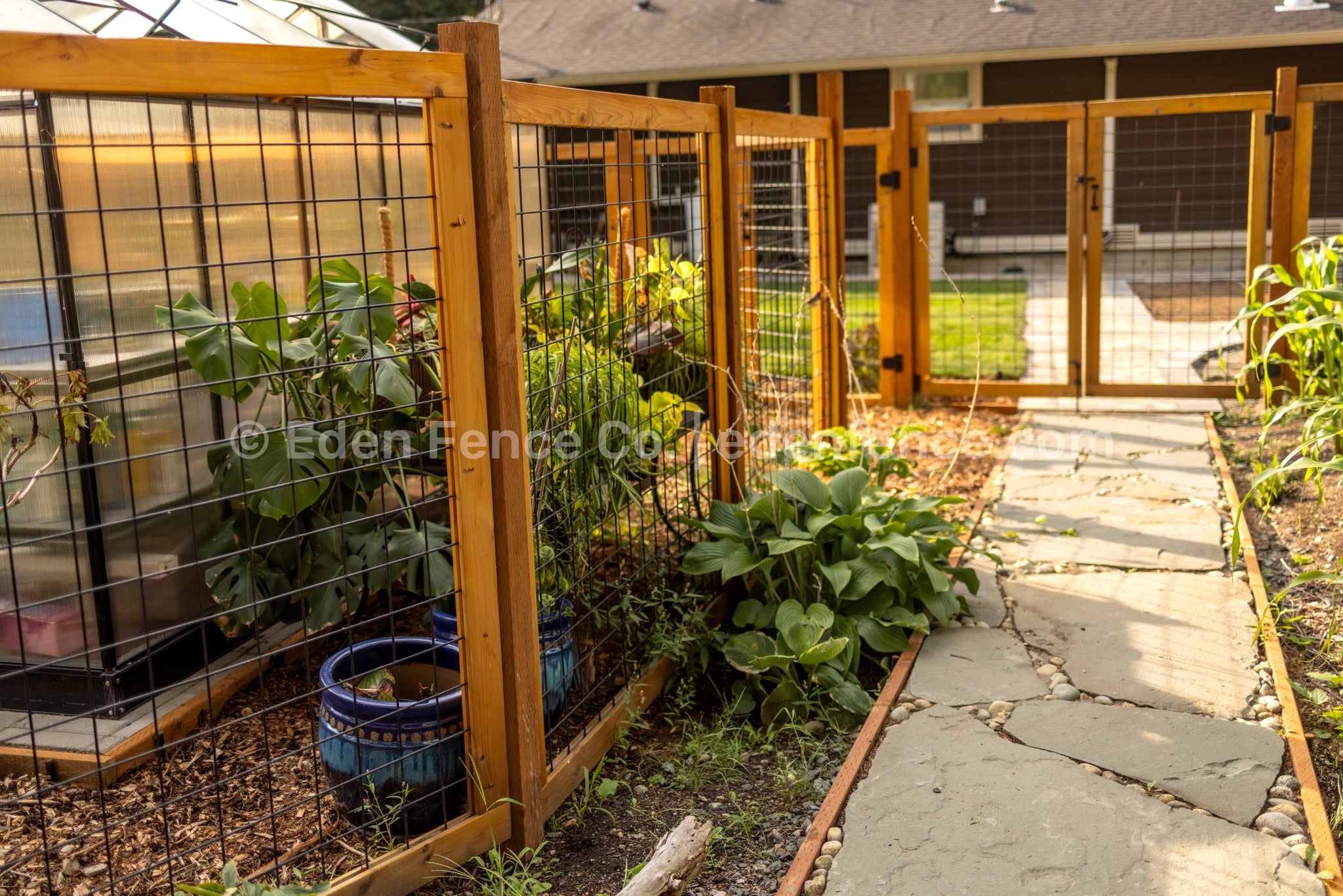 Goldbar, Washington garden area backyard with cedar hog panel fence by Eden Fence Co