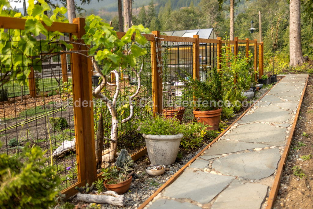 Goldbar, Washington backyard with cedar hog panel fence by Eden Fence Co